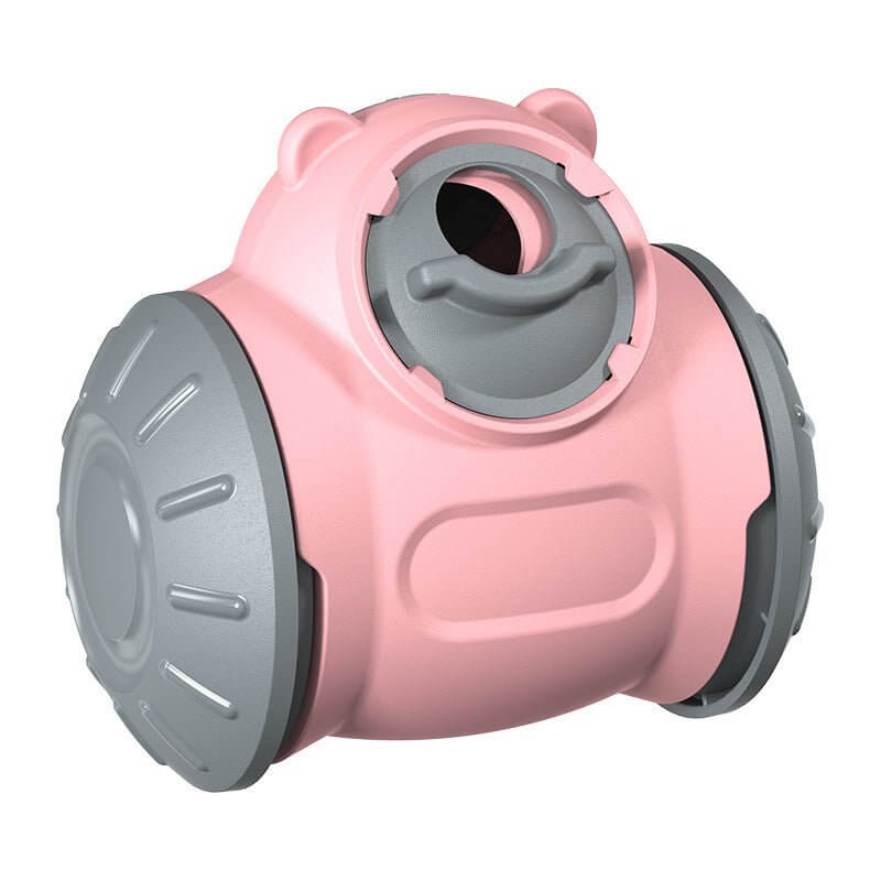 Interaktiv foder tumbler til hunde i pink og grå, designet til at stimulere dit kæledyrs spisetid og give mental stimulering.