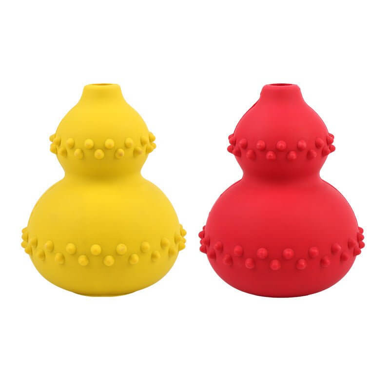 WuffWear Legebold - Snack & Bidestærk interactive dog toys in yellow and red, designed for durability and mental stimulation.